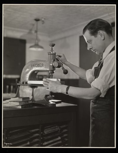 Working on type at Unz und Co., 24 Beaver Street, New York, 1932 by Byron Company